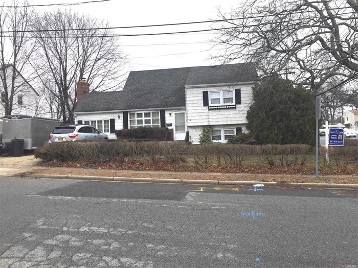 This Large Split Home Is Located On Stokes Ave. The Corn.Of Wantagh Ave N. Tenant Occup. Very Cooperative. 3 Bedrooms 1.5 Bath Lr. Dr. E.I.K. Family Rm With Fp. Partially Fin. Basement. Ground Level Is A 3 Rm .05 Bath Split With O.S.E. On Wantagh Ave. Tenant Is Moving So Please Disregard All The Boxes. The Home Needs Work And Being Sold As Is. Bring All Offers.