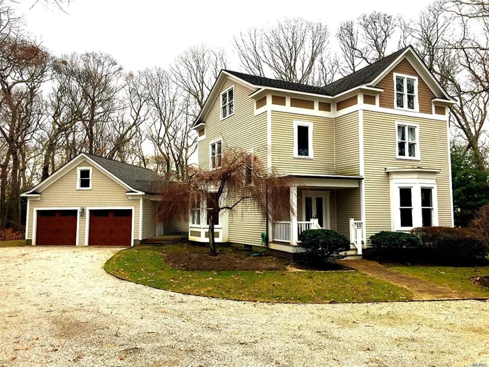 Charming North Fork Country Homestead Nestled Into Very Private Acre. Features Large Open Eat-In Kitchen, Wood Floors Thru-Out, High Ceilings, Lots Of Natural Light. 4 Bedrooms, 2.5 Baths, Wood Burning Fireplace, Detached Oversized 2.5 Car Garage.