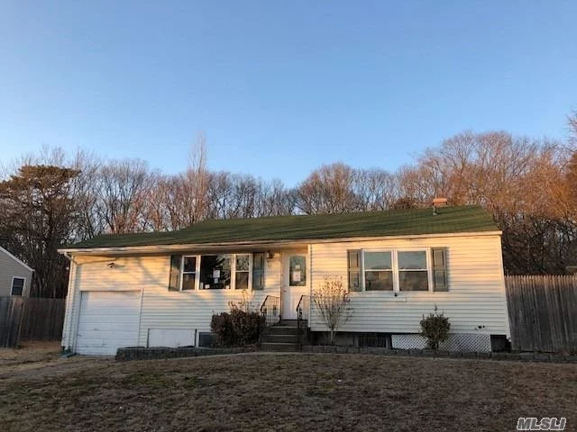 Cozy Ranch In Patchogue, Open Floor Plan Between Kitchen And Living Space. Wood Floors Throughout Give Home A Spacious Feeling. Wood Paneled Ceiling Fans In Each Room. Plenty Of Windows For Extra Natural Lighting. Full Finished Basement. Possible Rental Apt W/ Separate Entrance After Proper Permits. Large Rear Yard W/ Wood Deck. Close To Sunrise Hwy For Easy Commute.