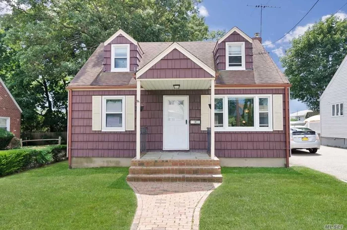 Move Right Into This Bright And Cozy 4 Br 1.5 Bth Home. Beautifully Renovated Kitchen With Dark Hardwood Cabinets, Granite Countertops And Stainless Steel Appliances, Updated 1.5 Bath, Hardwood Floors, 1 Year Old High Efficiency Boiler, Deep Fenced In Backyard. Close To Village And Lirr, Excellent Starter Home For The Right Buyer.