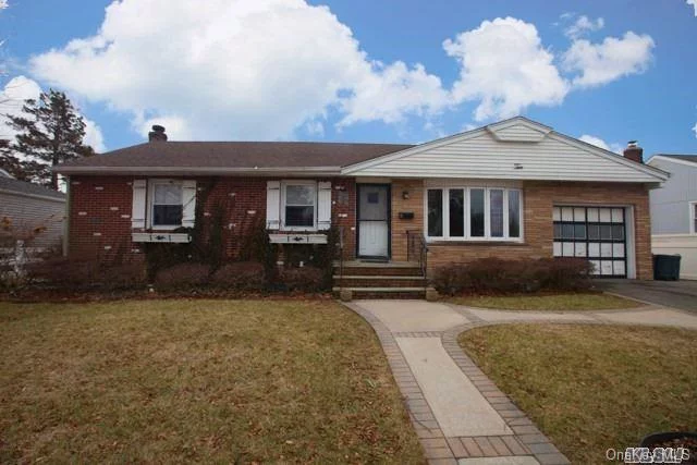 Unique 4 Bedroom Ranch! Updated, Sunny Kitchen With Fireplace, Hardwood Floors, New Roof (1 Layer), 200 Amp Service, Windows (8 Years Old), Oil Burner (10 Years Old). Huge Covered Deck, Fenced In Yard, Part Finished Basement And Close To Major Highways. Mid Block Location. Hurry!