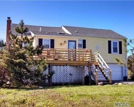 Bright Sunny Open Floor Plan With Wood Burning Fireplace And Large Living Room. 3 Good Size Bedrooms And Even An Office With A Water View! 2 Car Garage And Plenty Of Parking. Come Enjoy Beach Life Year Round!