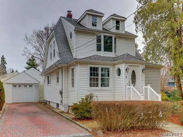 Spacious Home With Open Floor Plan Located On A Quiet Cul-De-Sac. Refinished Wood Floors, Granite Counter Tops, Anderson Windows. Two Oversize Bedrooms With Two Tiers Of Windows. Bedrooms Can Be Reconfigured To Add A Third Bedroom If Needed. Unfinished Basement With Outside Entrance. Long Driveway With Detached 1 1/2 Car Garage.