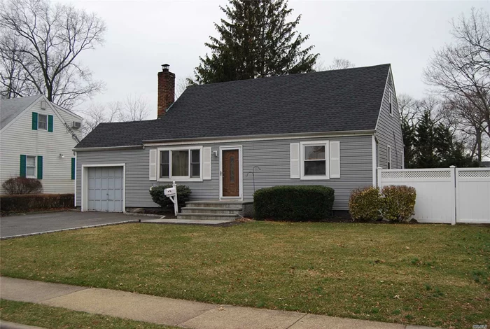 A 4 Bedroom Cape, Living Room With Pellet Wood Stove, New Eat In Kitchen, Bath, Garage, Large Fenced In Property, New Roof, Set Up For Generator And Hot Tub.