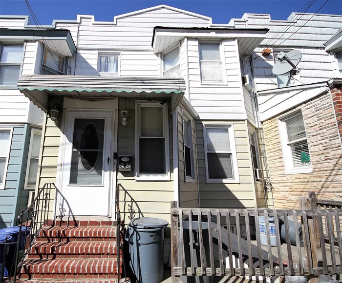 Attached 2-Family Home Featuring A 3 Bedroom Apt Over A 2 Bedroom Apt Plus A Full Finished Basement And Private Backyard. Well Maintained Home In Excellent Condition Close To Q58, Q39 And B57 Buses. Easy Access To Brooklyn. Zoned For Ps 153 Elementary And Is 73.