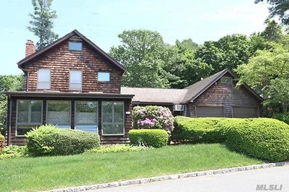 Truly Distinctive! Enclosed Front Porch Leads To A Spacious Open Floor Plan. Features Include Living Room W Brick Fireplace, Sun Drenched Updated Eik, Gleaming Hardwood And Stone Floors, Den W Full Bath, Master Bedroom W Beamed Ceilings, 2 Car Garage Or Bonus Room. Private Patio Overlooking Stunning Park Like Yard Perfect For Outdoor Entertaining. Natural Gas Available On Street. Syosset Schools. Walt Whit/Elem, Thompson Ms. Convenient To Train, Shopping And Highways. Taxes Have Been Grieved!