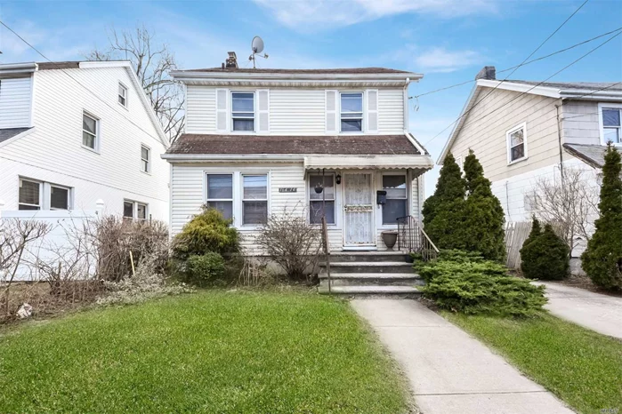 Det 2-Family Home Sitting On A 4, 000+Sq Foot Lot. First Fl Features 2 Brs, Lr, Kitchen, Bath. 2nd Fl 1 Features 1 Br, Lr, Kitchen, And Bath. Full Finished Basement With A Private Driveway And Detached Car Garage. 2 Min Walk To Q64/Q65 At 164St/71 Av Stop.