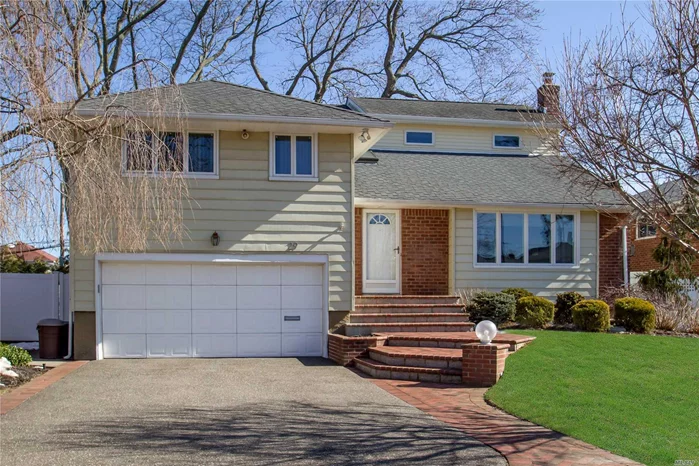 Beautifully Maintained Expanded Split In Clearview Village, Expanded Eik, Gas Cooking And Heat, Private Master Suite, Updated Baths, Family Room W/ Gas Fireplace, 2 Zone Cac, 3 Zone Heat, Hardwood Floors, 200 Amp, Beautiful Yard, Low Taxes, Baylis Elementary, Thompson Middle, Syosset Hs, Buyer May Apply For Star Exemption $1422.