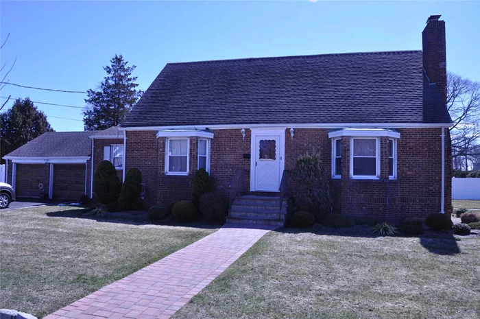 Wow! Legal 2 Family In The Village, 1st Floor Includes Living Room, Dining Room, Eik, 3 Bedrooms, Full Bath, 2nd Floor Includes Living Room, Kitchen, Bedroom, Full Bath! 2 Car Attached Garage, Full Basement.