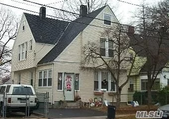 Bring The Whole Family To This Large Colonial Home With 4 Bedrooms And 2 Full Baths With Large Dining Room, Nice Size Backyard.... Low Taxes... Rare Find