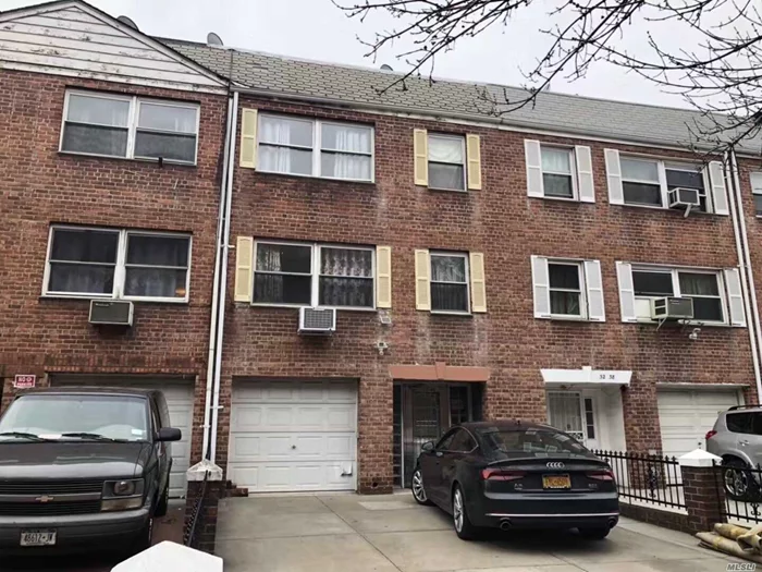 Legal Three Family Brick Home. Good Location Next To Northern Blvd, Three Stories Above Ground. Fire Alarm Systems All Around The Property. 3 Gas Meters. Great Opportunity For Investment.