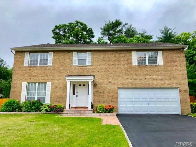 Beautifully Maintained Oversized 5 Bedroom Center Hall Colonial In Prestigious Waterfront Community. Warm And Elegant Entry With Opn Flr Pln. Formal Den Adjacent To Fam Rm W/Sliders That Lead To A Private Deep Yard W Custom Decking. Updates Throughout Include 1 Yr Old Roof, Eik With Grnte Countertops, Custom Made Pantry, Updated Bthrms, Outside Pavers And More! Full Finished Bsmnt Perfect For Entertaining W/ Wet Bar, Ext Rm For Offc. Locust Valley Sd. Beach And Mooring Rights. Not A Flood Zone!
