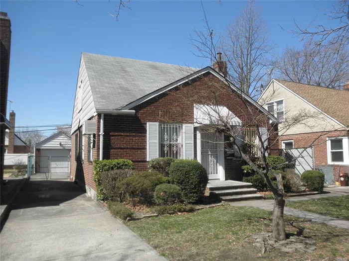 Lovely Detached Brick Cape Set On 40X100 Property. 27X33 Building Sized. Nice Hardwood Fl Thru Out . 1 Car Garage, Prime Bayside Location. Best School Dist#26 , Ps162, Jhs 74. Must See.