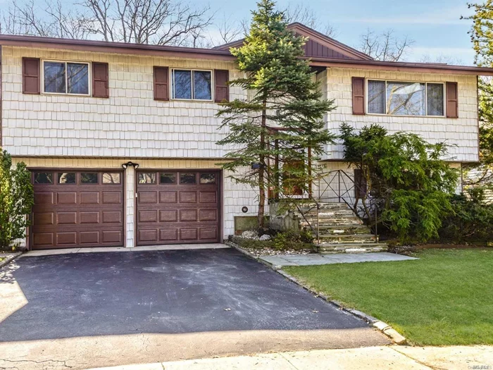 Major Price Improvement! Bright And Airy 4 Bedroom, 2 1/2 Bath Hi Ranch In Soundview. Lr/Dr, Eik With Access To Deck, Hardwood Floors, Den With Trendy And Gorgeous Hardwood Ship Lap, Cac, Laundry, 2 Car Attached Garage.