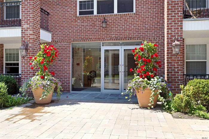 Sunlit Open Floor Plan With Tile Floors And Granite Kitchen.A Balcony, 1 Underground Parking Spot And Fitness Center