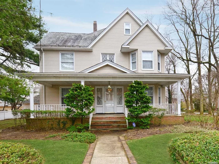 Roslyn Heights. Gracious Historic Colonial/Victorian Set On 100 X 100 Parklike Property With Landscaping By Gary Duff. Home Boasts A Formal Living Room And A Formal Dining Room, An Updated Eat-In-Kitchen With Stainless Steel Appliances, A Laundry Off Of The Kitchen, Hardwood Floors Throughout, Alarm And In-Ground Sprinklers. Historic District Of Roslyn Heights.