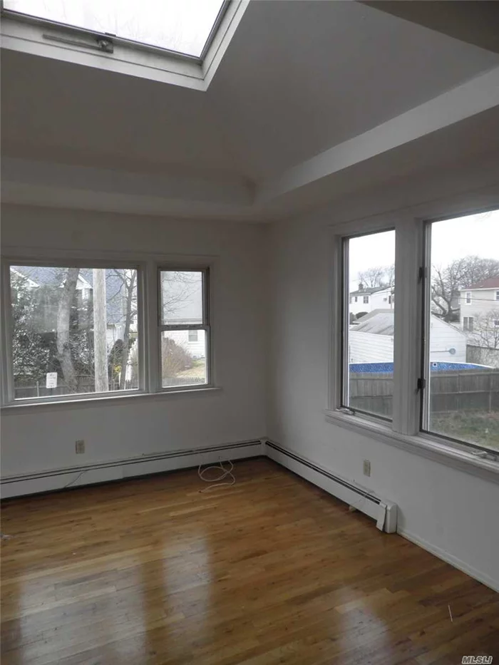 Spacious Sunny 3 Bedroom Top Floor Apartment. Large Skylight, Eatin Kitchen, Large Living Room And Dining Room, Eat In Kitchen, Spacious Bathroom,  Wood Floors Through Out, Close To Lirr And Shopping, Highways. Hicksville School District  No Pets