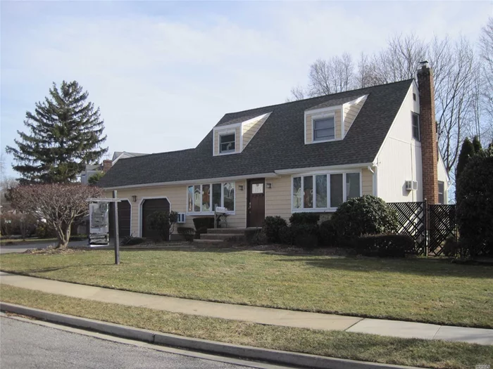 Expanded And Updated 4 Bedroom Cape With 2 Car Garage In East Norwich Radcliff Section. Updated Kitchen With Stainless Appliances, Beautiful Wood Flooring, Extended Living Room With Oversized Sliders That Spill Out To Beautiful And Inviting Large Paver Patio.