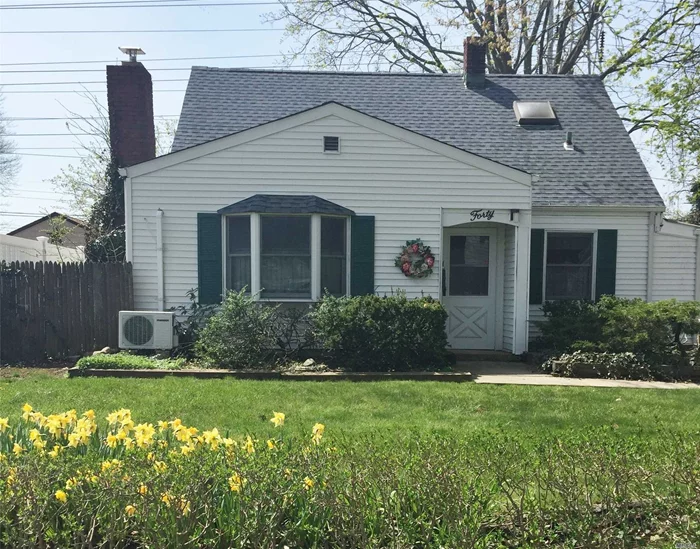 How About An Expanded Cape Cod To Make Your Very Own ? Lower Level Extension Gives This Home An Interchangeable Layout To Leave To Your Own Imagination. Mid Block Location, Over Sized Property, Newer Roof, Some Replaced Windows, Hardwood Floors Along With Newer Carpeting, New Main Bath, Over Sized Garage With New Door, 100 Amp Service & More ! The Possibilities Are Endless !