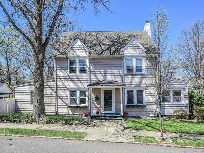 Stately Center Hall Colonial In The Desirable Park Section. Living Room W/Fplc, Formal Dining Room, Office, Den. 1/2 Bath And Eik.