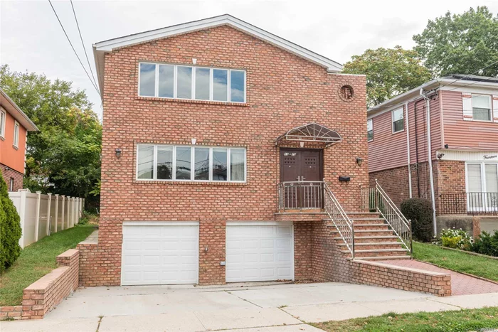 Bay Terrace: Large All Brick 2Fam (3Br/2Bth X2) With Finished Basement And 2 Car Garage. This Lovely Home Was Rebuilt In 2014 And Is Conveniently Located Near Shopping Center, Bayterrace Mall, Clearview Golf Course And Cross Island Parkway. High Income Potential, Sd #26, Cac, Hardwood Floors. 2 Separate Gas And Electric Meters, Each Floor 1248 Sq Ft.