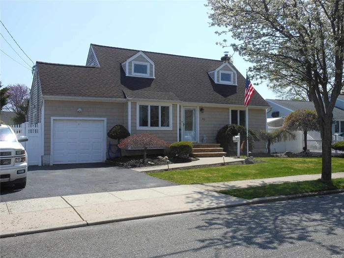 Beautiful West Babylon Cape ! New Kitchen With Sliders To Yard, Newer Roof, Porcelain Tiles, Recessed Updated Bath, 4 Beds, Garage With Loft Storage Dbl Dvwy 3/4 Finished Bsmt Mature Landscaping Igs Ductless Ac 5 Units Warrantied, Crown Molding Too Much To List. Come Fall In Love !!!