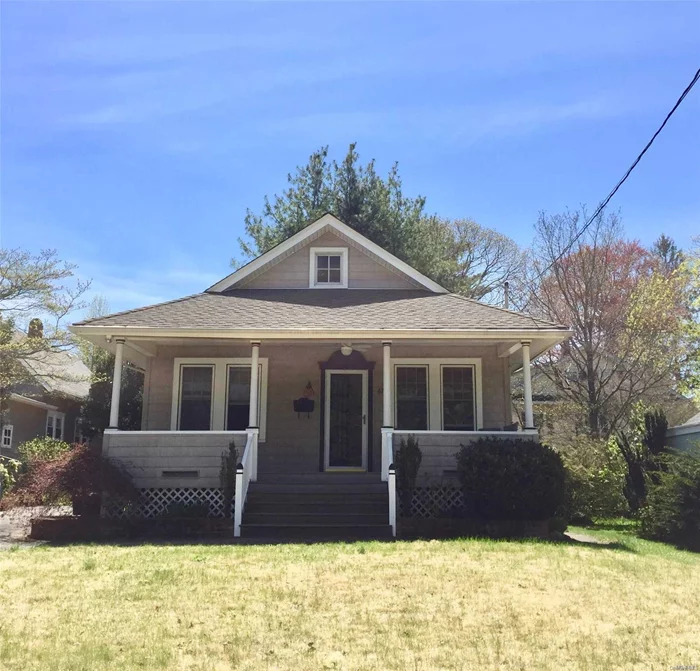 Easy Living Awaits Upon Approaching The Granny Porch Of This Craftman&rsquo;s Bungalow. Wood Floors & Hi Ceilings Throughout. Offers 2 Bedrooms, Living Rm, Dining Rm, Kitchen W/Large Pantry & Outside Entrance To Back Porch. Full Updated Bath W/Claw Foot Tub; Full Unfin Basement. Laundry And Utilities.Large Walk-Up Attic For Possible Artist Studio/Office/Storage. Driveway Parking And Fenced Yard.North Shore Schools, Beach Privileges. Quick Stroll To Elem School/Shops/Dining/Rr.