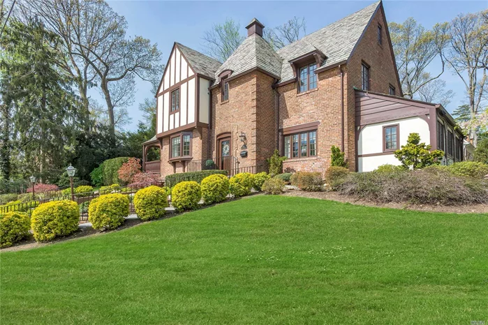 Spectacular 4 Bedroom/ 2.5 Bath Tudor. Recently Renovated And Decorated With Exquisite Detail And Workmanship This Home Is Not Your Typical Tudor. Elegant, Bright And Spacious With A Contemporary Kitchen And Bathrooms. Pristine Landscaping And Grounds. Close To Train.