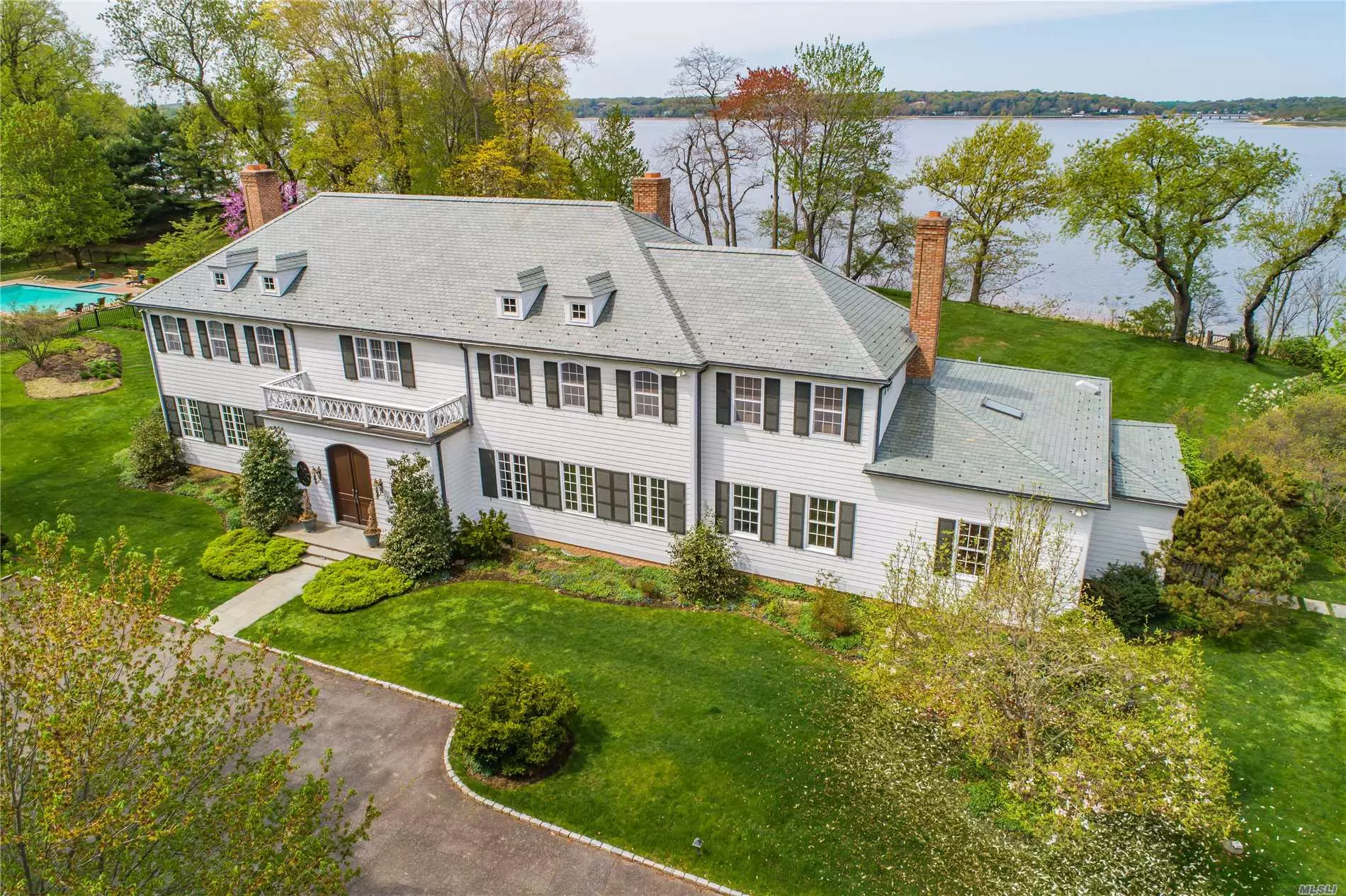 New Price. Breathtaking Western Water Views And Sunsets Plus 394&rsquo; Of Sandy Beach. Elegance Abounds In This Custom Colonial With 12&rsquo; Ceilings, Tall Arched Doorways And Stunning Mill Work. Every Room Captures Magical Views Of Ob Harbor. Incredible Details Include Curved Stairway, Maple Paneled Library, Floor-To-Ceiling Windows In Sunroom, 4 Fpls, Mahogany Doors, Chippendale-Style Railings On Balconies, Lighted Steps To Beach, Plus Htd Pool & Pool House.Floating Dock Allowed. Taxes Being Grieved. #virtualopenhouse https://danielgale.zoom.us/j/97408382267 05/03/2020 2:00 PM-2:30 PM