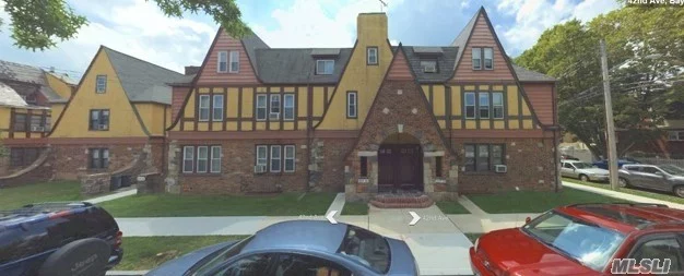 Large And Bright Duplex Unit In A Tudor-Style-Exterior Complex With Separate Entry. Eat-In Kitchen With Stainless Steel Appliances, Spacious Living Room And Dining Room. Master Bedroom On The Second Floor. 3 Additional Bedrooms With Hardwood Floors And Second Bathroom On Third Floor.