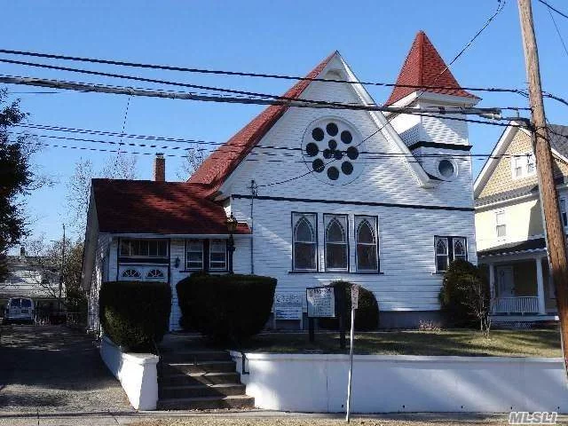 C/O Religious Service Building And Parsonage.