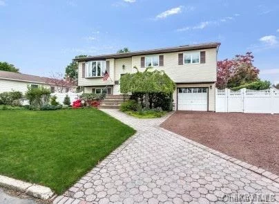 Lovely Hi Ranch In Commack Rd Area! Beautiful Hardwood Floors, New Kitchen Appliances, Large Master Suite (Was 2 Bedrooms) Den With Fireplace, Wet Bar, Central Ac, Trex Deck, Ig Pool, This Is The One You Have Been Waiting For!!-