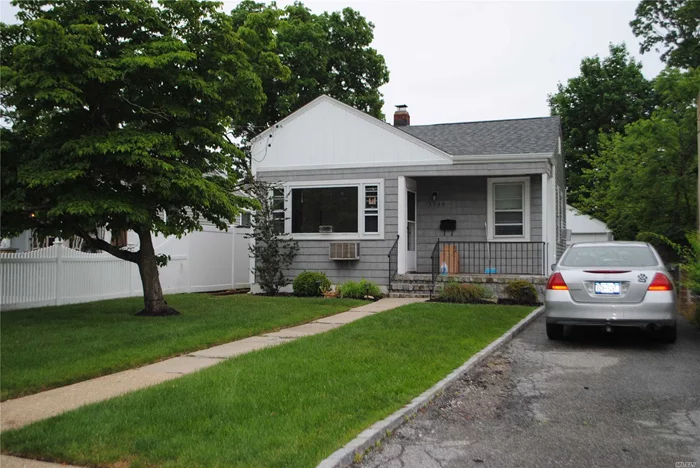 2 Blocks From Wantagh Train Station! Cute And Cozy 2 Bedroom House. Galley Kitchen, Hardwood Floors, Unfinished Basement For Storage.