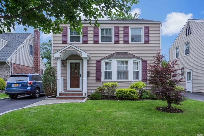 Outstanding Mid-Block Colonial, All Updated Stainless Steel Appliances, Granite Counters, Cherry Cabinets, Near Railroad, Park & Schools. A Must See!