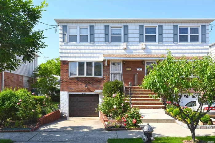 Beautiful Semi- Detached Brick Home! Extra Large Sunken Living Room, Tremendous Formal Dining Room Area, A Full Eat-In Kitchen. Separate Back Door Entrance From The Kitchen Leading To A Beautiful Backyard Patio Area, And Full Fenced Backyard. 3 Large Bdms .Large Master Suite Bedroom With Two Large Closets! Other Two Bedrooms Are Also Considerably Large. Closets And Storage Space Galore! Full Spacious Bathroom With Room For A Double Shower! Finished Basement- Separate Entrance !