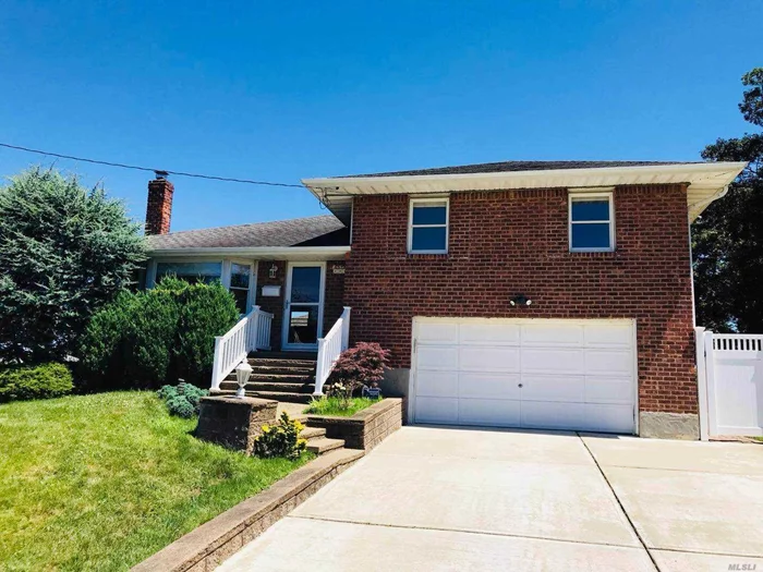 Well Maintained Split Level 4 Bedrooms 2 Bathrooms House In Jericho. Hard Wood Floors, Updated Kitchen, In-Ground Sprinklers For Garden Etc, Syosset Schools. Closed To All.