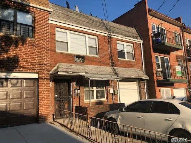 Two Family Home Features A Total Of 4 Bedrooms, 2Baths, 2 Eik, 2 Living Rooms, Full Finished Basement, Private Driveway, Attached Garage, Backyard, Gas Boiler. Located Close To All Amenities.