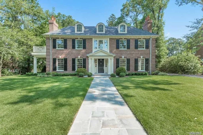 Stunning & Grand Newly Constructed 6 Bedroom Brick Center Hall Colonial Set On One Of The Prettiest Tree Lined Streets In Manhasset. 5200 Sq Ft Of Luxury On Approx Half An Acre Of Beautiful Lush Property. Bespoke Woodwork And Cabinetry With Incredible Attention To Detail With Select Custom Finishes Through Out. Gourmet Custom Eat In Kitchen Blending Traditional Design & Luxurious Modern Living, Stylish Entertaining Spaces & A Master Suite Oasis With Spacious Mahogany Deck Overlooking Property.