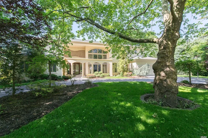 Magestic Custom Built Contemp W/Soaring Double Height Entry, Floor To Ceiling Windows Welcome You To This Dramatic Sunlit Home. The Open Floor Plan Features Large Lr, Dr + Family Rm, State-Of-The Art Kit Opens Onto A Stone Veranda Overlooking 1/2+ Acre Of Lush Manicured Gardens. This Home Boasts A Heavenly Master Suite + Bth And 7 Add. Family Bdrms, 4.55 Baths.A Walk Out Bsmnt, Radiant Heat Thru Out. All In The Village Of Lake Success W/Private Police, Golf, Pool And Tennis.