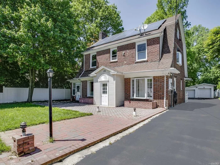 Brick Dutch Colonial On Huge Fenced Property. Spacious Living Room, Formal Dining Room, Finished Basement. New Windows, New Bathrooms, New Floors, New Doors And Newly Painted. Home Is Energy Efficient With Solar Power. Near Shops, Restaurants, Beaches, Lirr, And Golf Course. 13, 650 Sqft Lot.