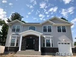 To Be Built!! New Construction In Syosset Groves!! 5 Bedrooms, 4 Baths W/ Hardwood Floors. 9&rsquo; Basement Ceiling W/Ose. 9&rsquo; Ceiling On 1st Floor W/ Kitchen, Lvg Rm, Dining Rm And Family Room W/Gas Fireplace. Master Bedroom W/ Large Walk In Closet. Master Bath. Laundry On 2nd Floor. Time To Customize Is Now! Wont Last!  Photo Not Exact.