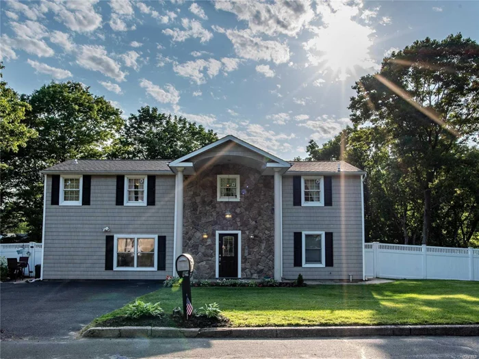 This House Has Everything You Are Looking For, Plus Room For Mom. Take A Look At This Stunning 5 Bedroom, 3.5 Baths Colonial Situated On A Picturesque Block In The Middle Country Schools. This House Boasts A Stunning Kitchen With Ss Appliances, Granite Countertops, Bar And Office Area. Move Right In!   (Mother-In-Law Suite Not Pictured)