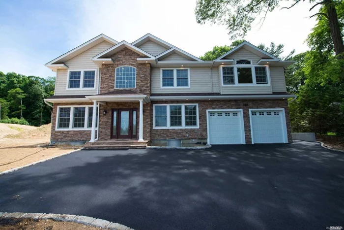 Beautiful New Construction Home Built On Shy Of Half An Acre. Wood Floors, Granite And Marble Counter Tops, Ss Appliances, Ceramic Floors, Led Hi Hats. Constructed On A Hill. Very, Very Impressive. Way Too Much To List! Go Show And Sell! Blue Ribbon Village Elementary School. Minutes From The Lirr.