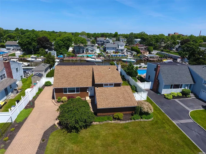 Willetts Point Water Front Split With 75 Ft Of Navy Bulkhead On Deep Water Canal With Electric Boat Lift. In-Ground Pool, Paver Driveway & Patio, Igs, Cac, Stone Gas Fireplace, Wood Floors, Newer Boiler, 200 Amps Electric Service And So Much More! This Home Is Clean, Well Maintained & Move In Ready. Don&rsquo;t Miss Out On This Wonderful Opportunity!