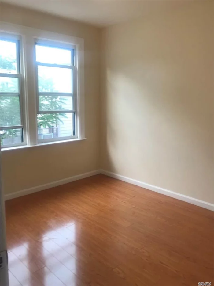 Nice And Bright 2nd Floor Apartment With Mutiple Windows For Natural Lighting, Wood Flooring Throughout, Eat-In Open Kitchen, Generous Closet Space And More. Just Steps From Bus Stops: Q39 (Queens Plaza/L.I.C.), Q58 (Flushing), Q59 (3 Queens Blvd Malls/M, R Subway), B57 (Downtown Brooklyn).