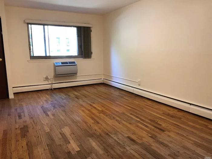 Freshly Renovated Two Bedroom Apartment Located In Young Solid Brick House. Hardwood Floor Throughout, Marble Bathroom. Brand New Led Lighting. Heat And Hot Water Pay By Landlord. One Block To All Shopping & Buses. Three Blocks To Lirr & Subway.