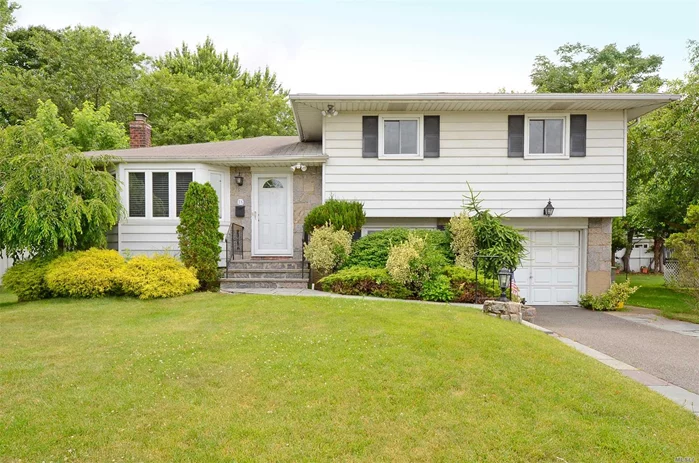 Beautiful 3 Bdrm, 2 Bath Split In Sought After Syosset Schools. Newer Appliances And Granite Kitchen With Gas Cooking. Sliding Doors Open To Lovely Deck And Backyard. Freshly Painted, Hardwood Floors And New Basement Carpeting. Great For Commuting, Close To Highways And Train. Won&rsquo;t Last.