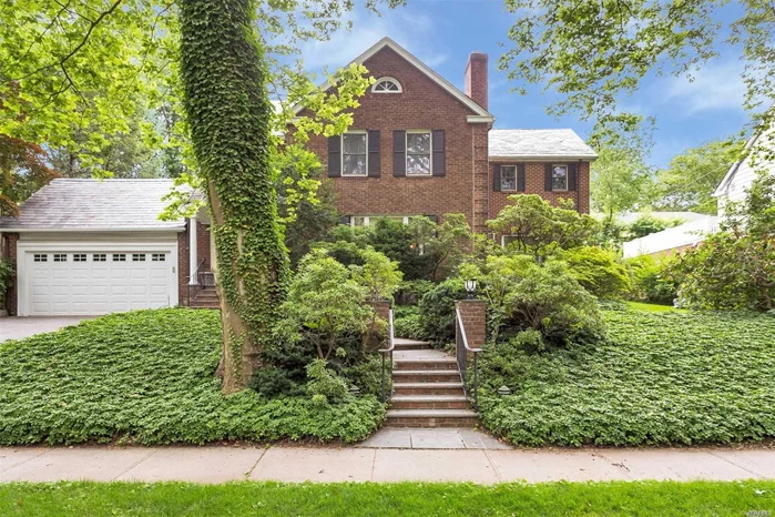 Charming Solid Brick Colonial Home In Russell Gardens Situated On .30 Acres Of Park-Like Property, Featuring 4 Bedrooms, 3.5 Bathrooms, Expanded Eat-In Kitchen, Large Living Room, Formal Dining Room, Library/Den, Sun Room, Updated Master Bedroom Ensuite, 2 Car Garage, Partially Finished Basement, Private Community Pool, Park, And Tennis, Walk To Lirr, Lakeville Elem And South Middle & High School