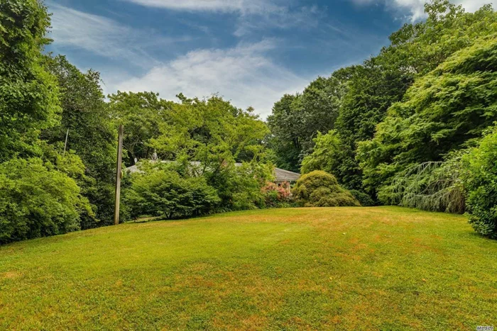 Situated In One Of The Most Sought After Oyster Bay Cove Communities On Over Two Lush & Beautiful Acres Sprawling 4 Bedroom Ranch W/ 2571 Sq Ft Of Endless Possibilities, Hardwood Floors Throughout, Walk Out Basement, Beach & Mooring Rights