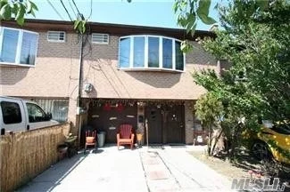 Attached Two Family Home. Brick & Block Construction. 3 Bedroom Apt. Over 2 Bedroom Apt. And A Finished Basement. Brick And Concrete Block Construction. New Gas Heat. Well Maintained.